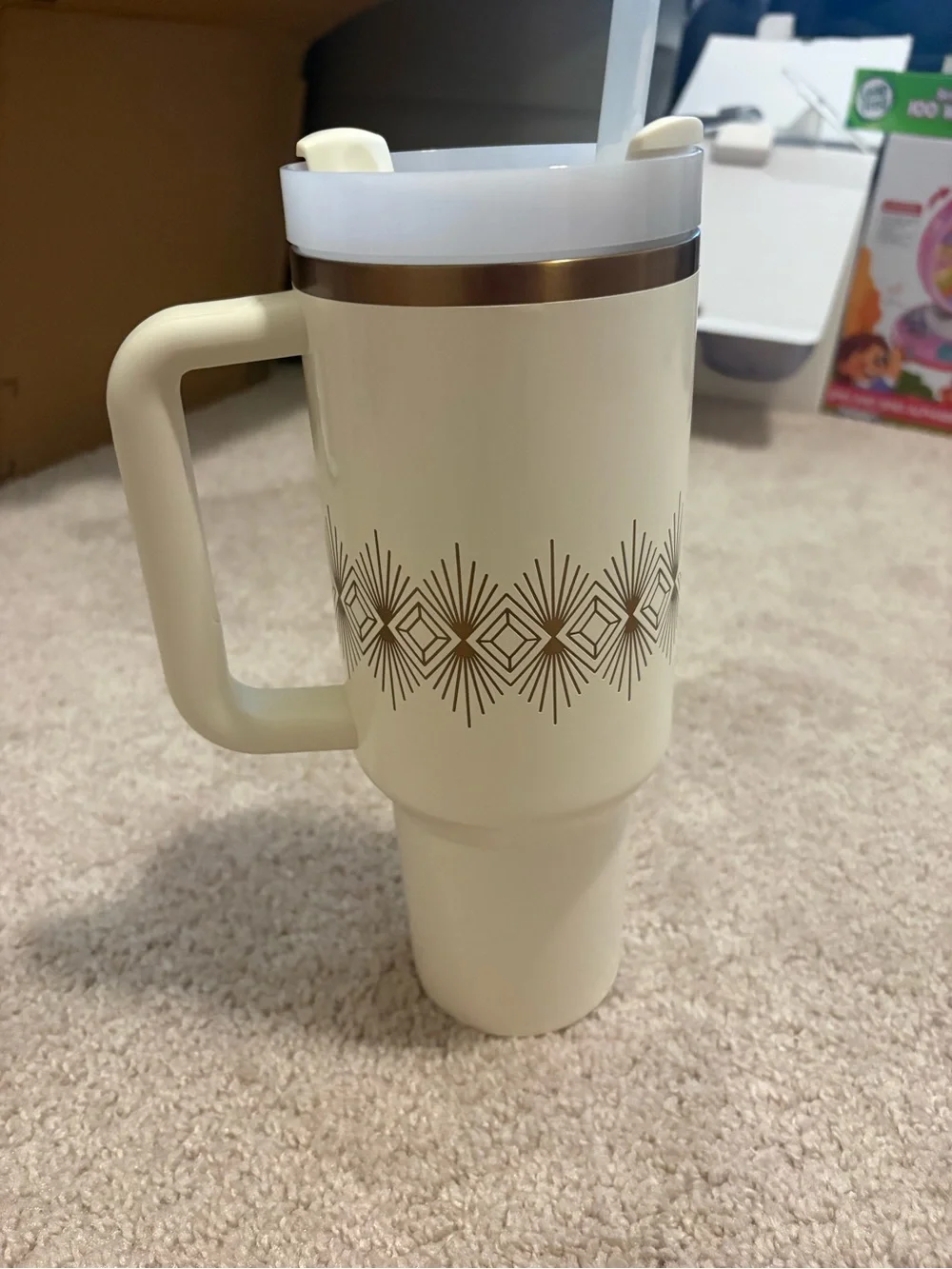 Stanley Quencher H2.0 FlowState Tumbler in Cream Gloss from the limited Deco Col